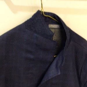 The jacket is made in Canada. It is around 70 years old